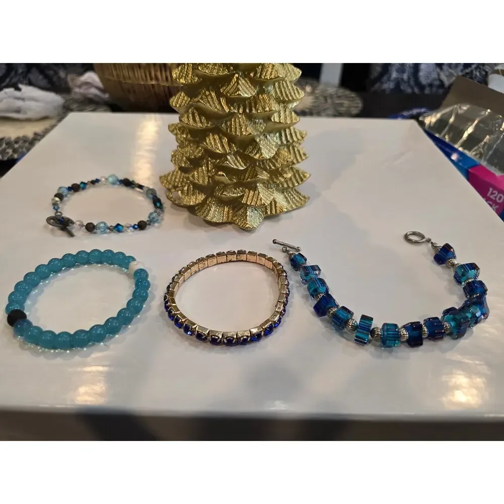 Bulk blue bracelets, one nicely beaded